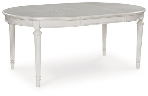 Montelaine Dining Extension Table - Mattress & Furniture Super Center (Tampa, FL)