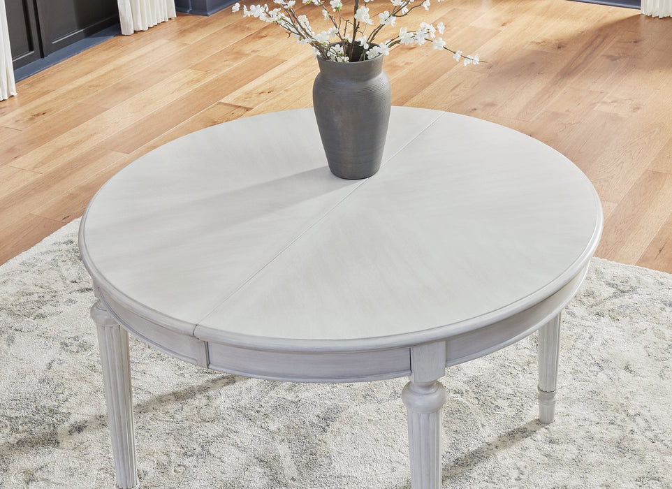 Montelaine Dining Extension Table - Mattress & Furniture Super Center (Tampa, FL)